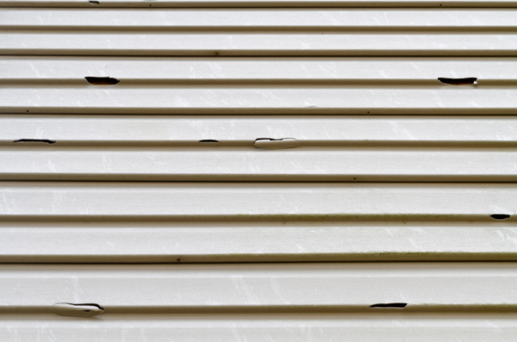 1. Warped or Uneven Panels 5 Signs Winter Ruined Your Siding (And You Didn’t Notice)